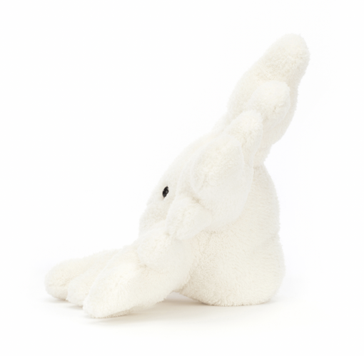 Peluche blanche de la marque Jellycat vu de côté.