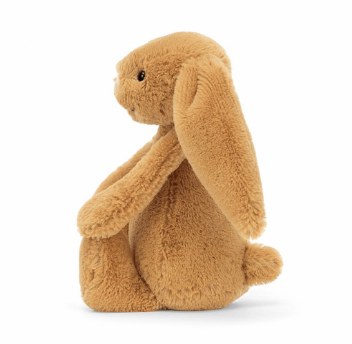 Petit lapin doré de la marque Jellycat. Ce lapin possède des grandes oreilles.