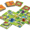 Jeu de société Mon Petit Carcassonne en vue d'ensemble. Jeu de société stratégique accessible à partir de 4 ans.